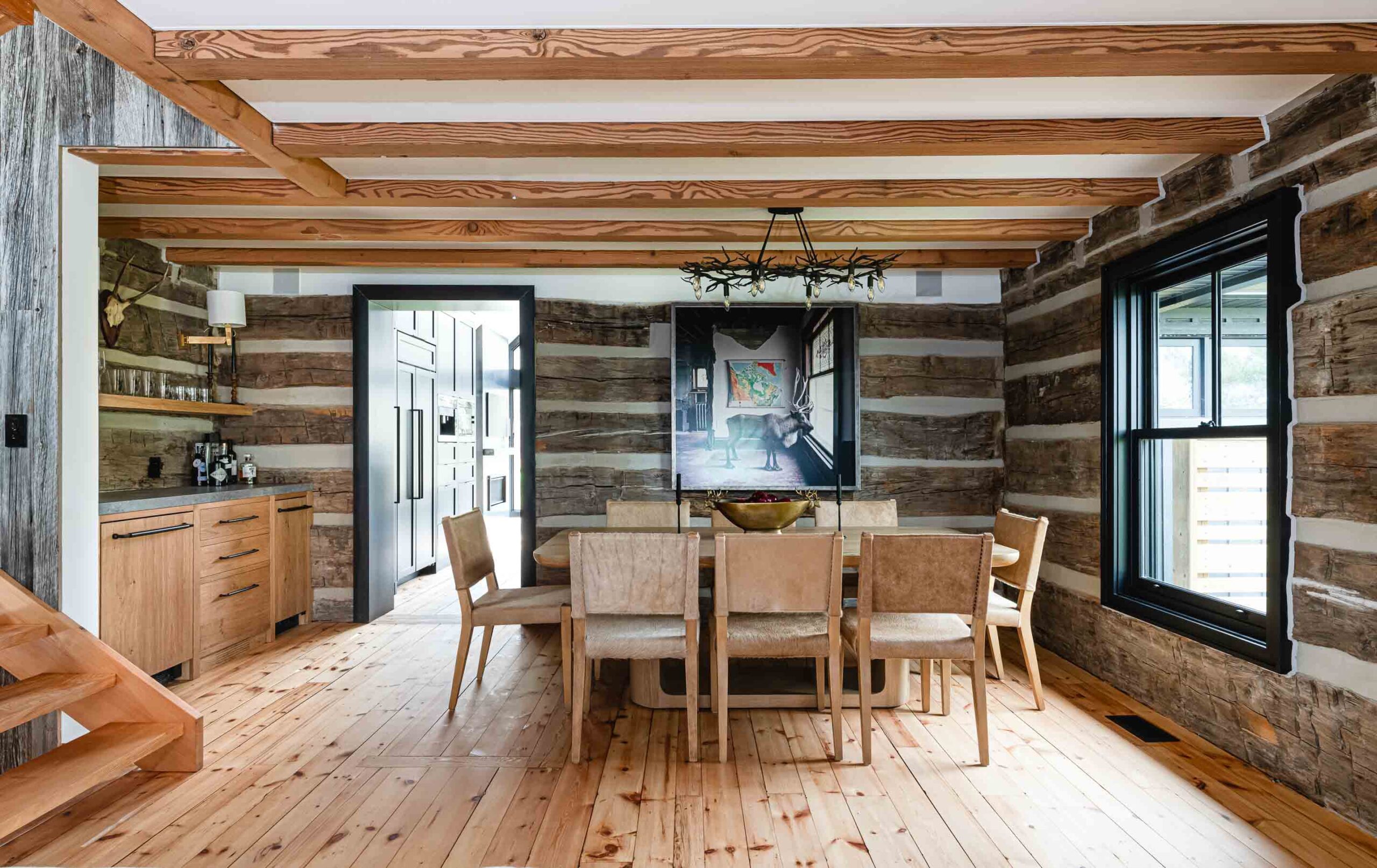 Dining room in a modernized rustic chalet renovated by Blake Farrow Project, designed by FAD