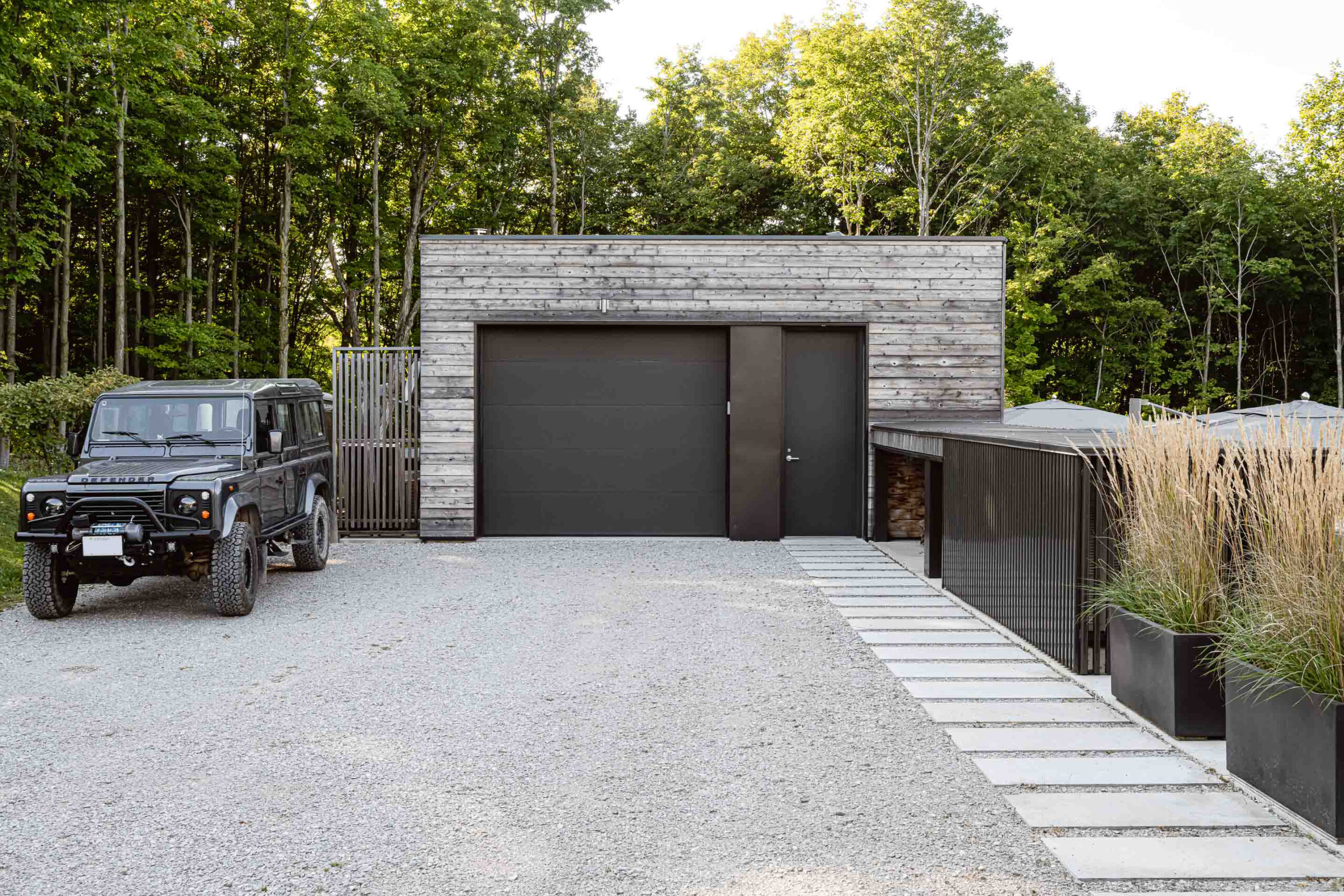 exterior of a minimalist, modern garage and shop