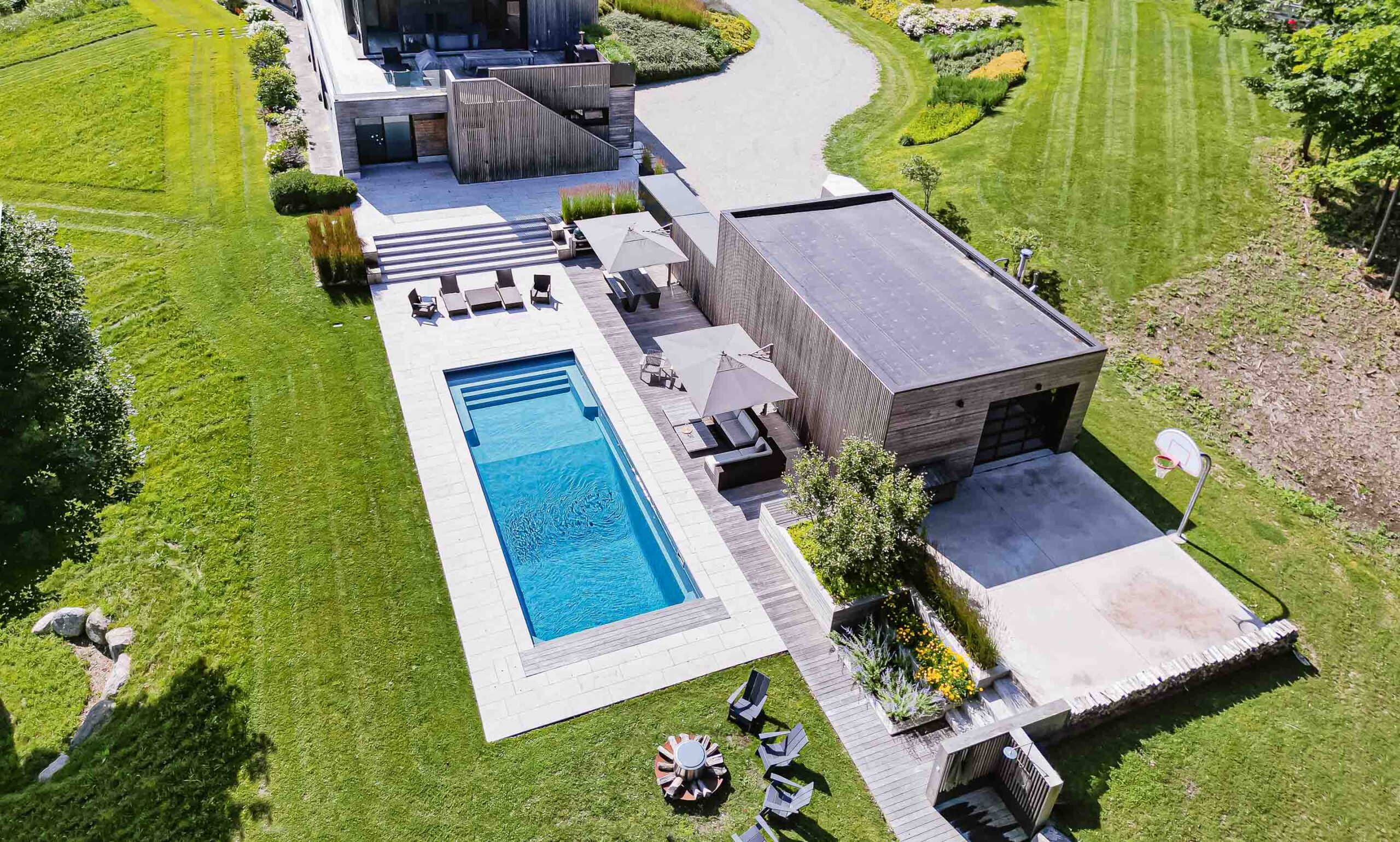 aerial view of a Contemporary studio and pool build by Blake Farrow Project, architect AKB, landscape design by Joel Loblaw