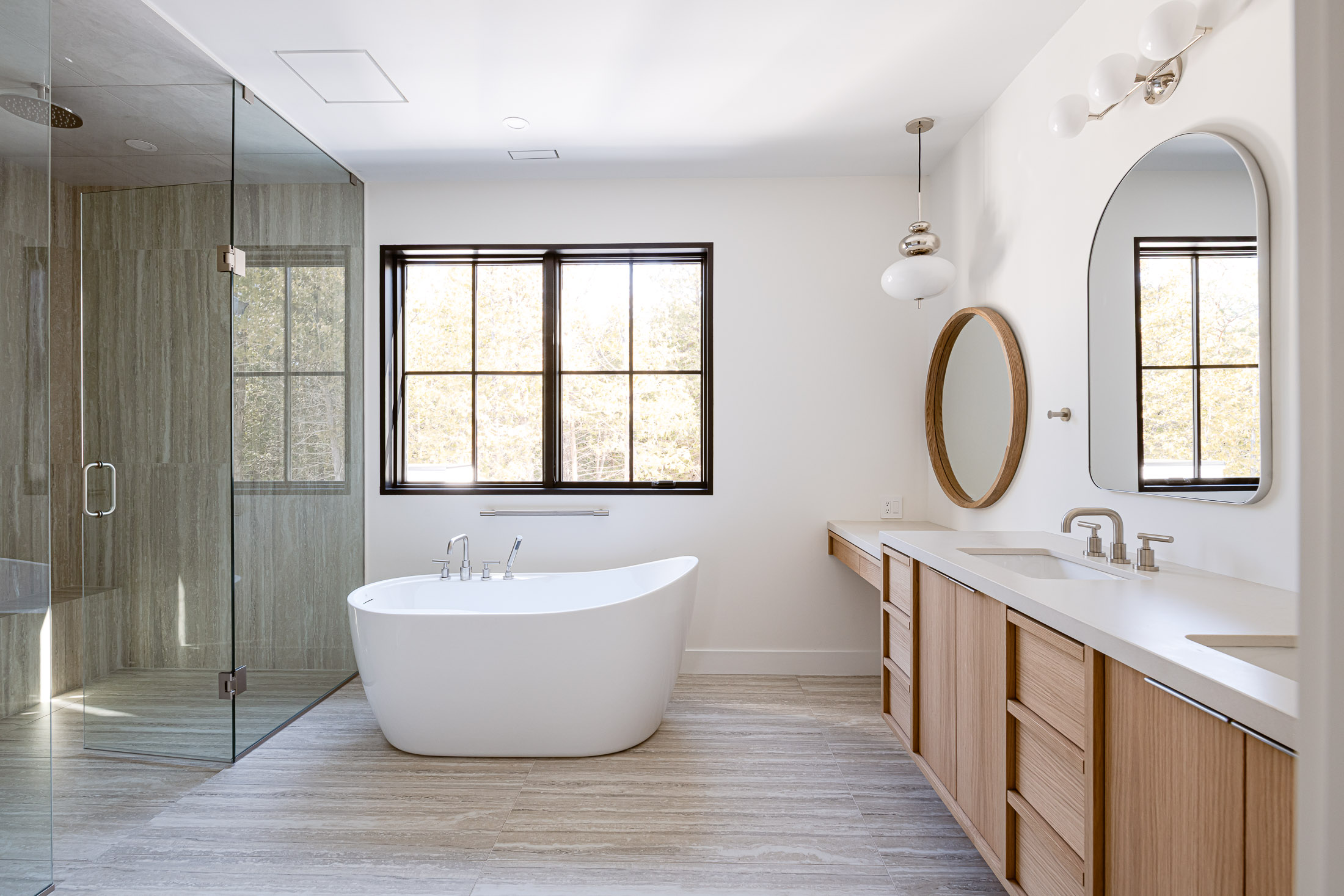 Modern beach house primary bathroom by Collingwood custom home builder