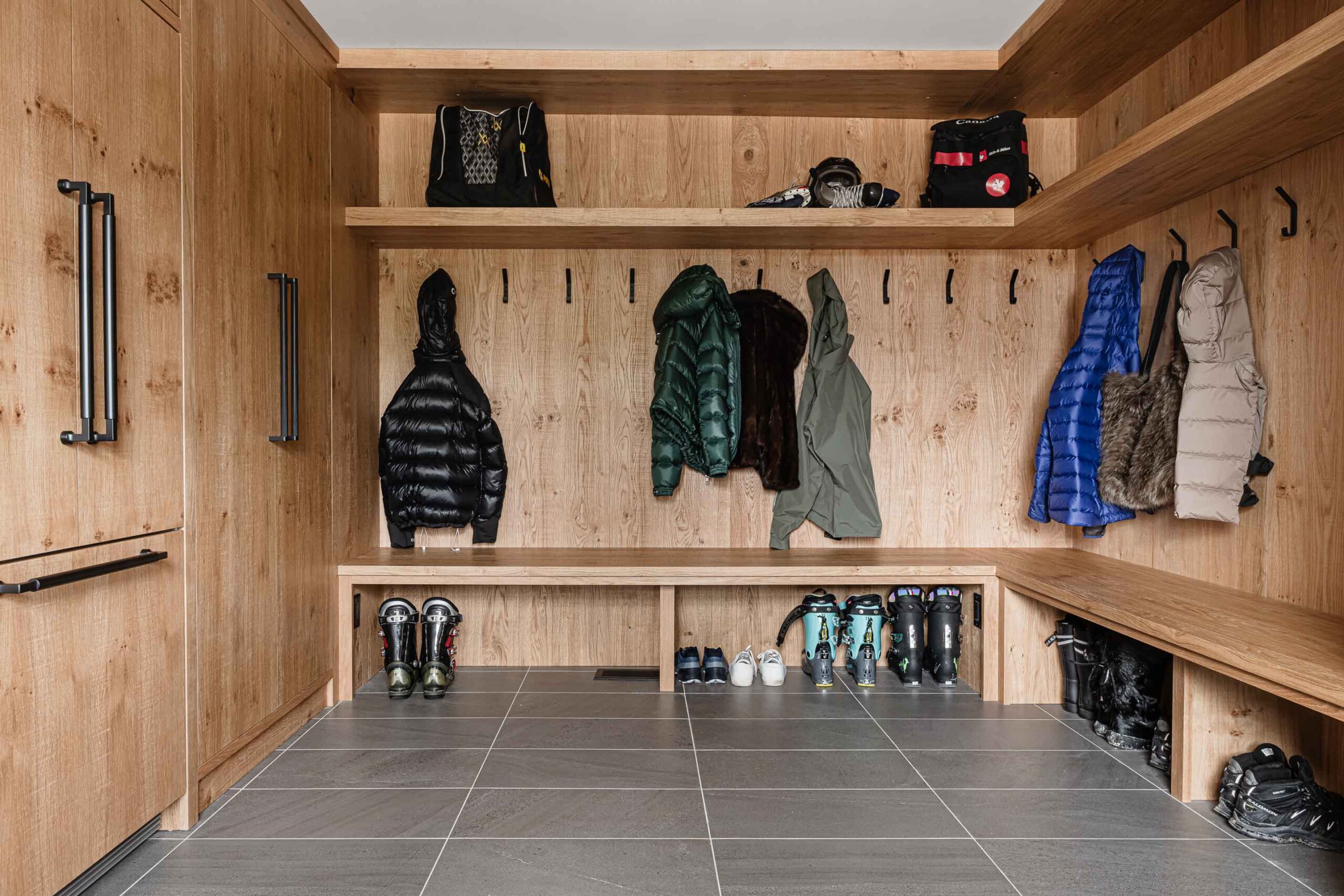 custom cabinetry in a mud room ski gear room in a chalet renovated by Blake Farrow Project Management