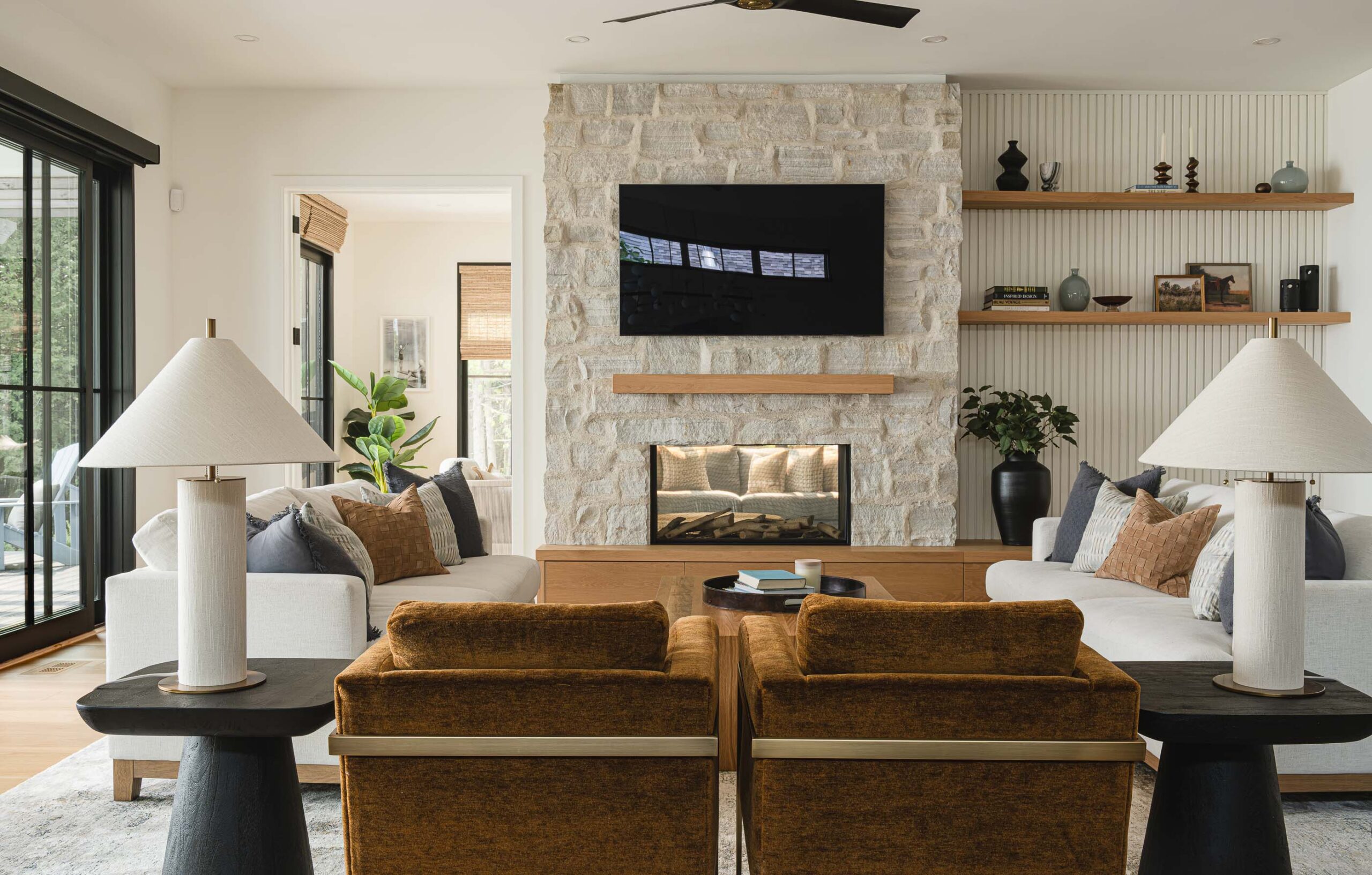 Stone fireplace and shiplap detailing in a Collingwood modern beach house