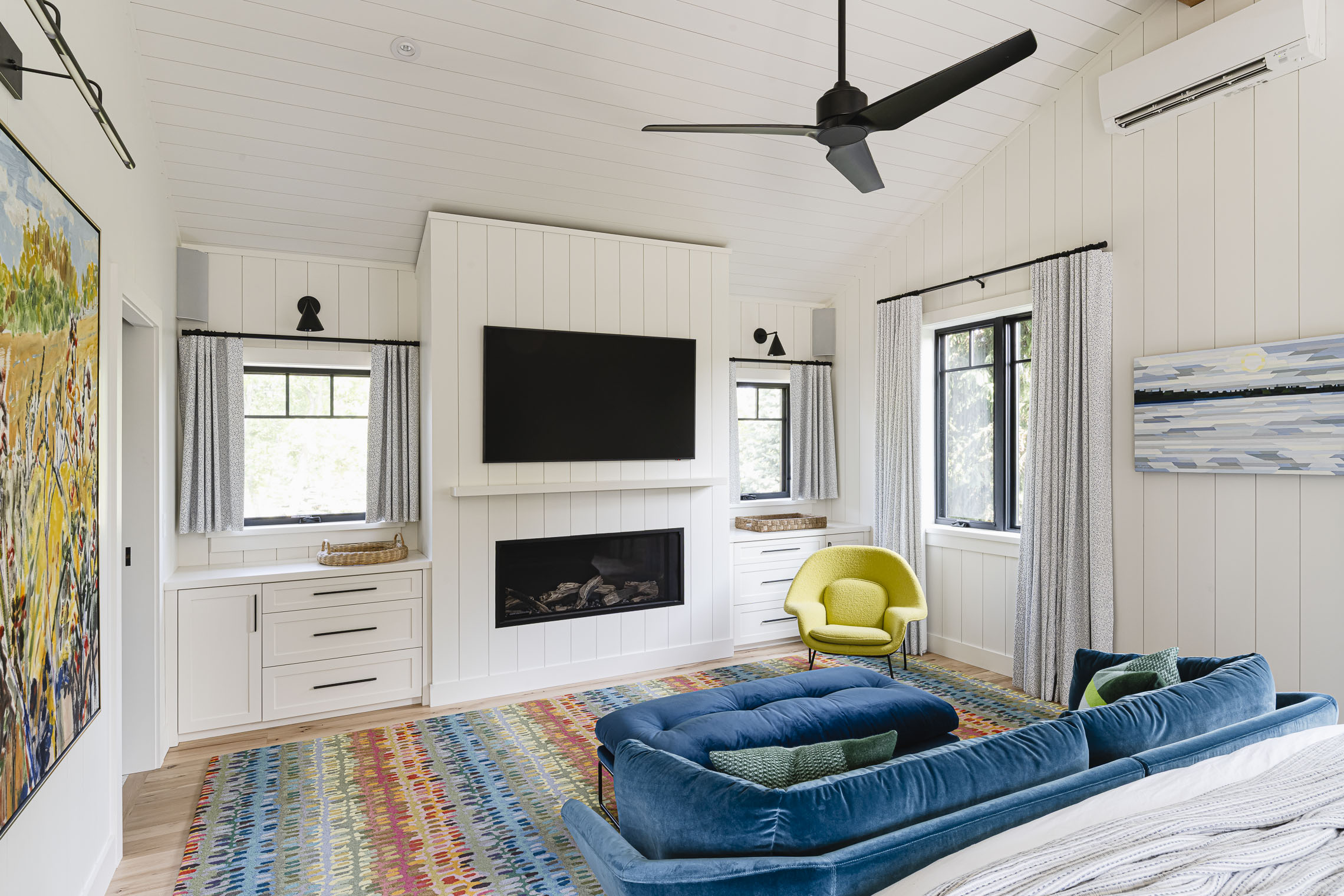 shiplap and custom millwork and fireplace in a chalet bedroom