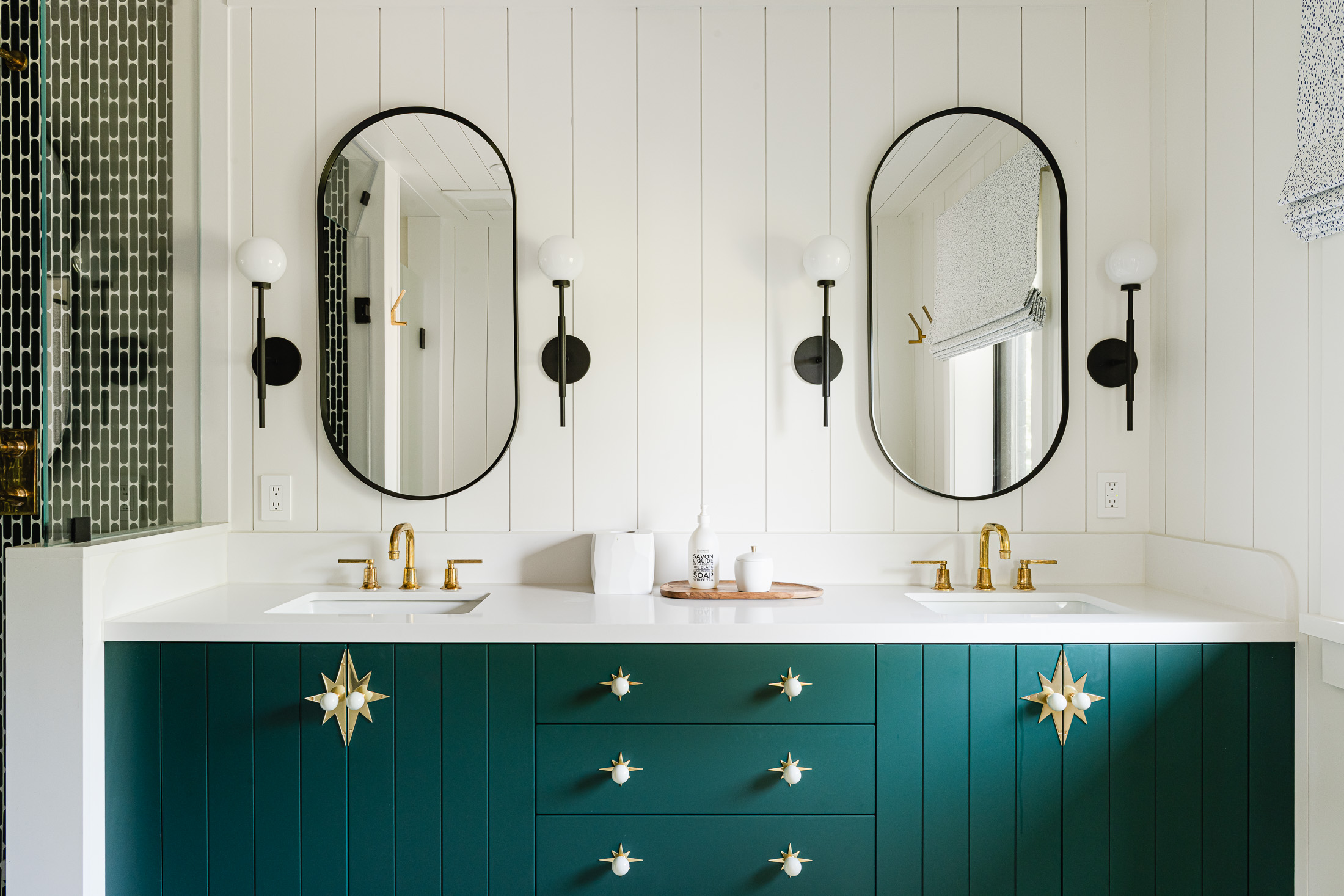 colourful tile, shiplap and millwork in a fun chalet bathroom