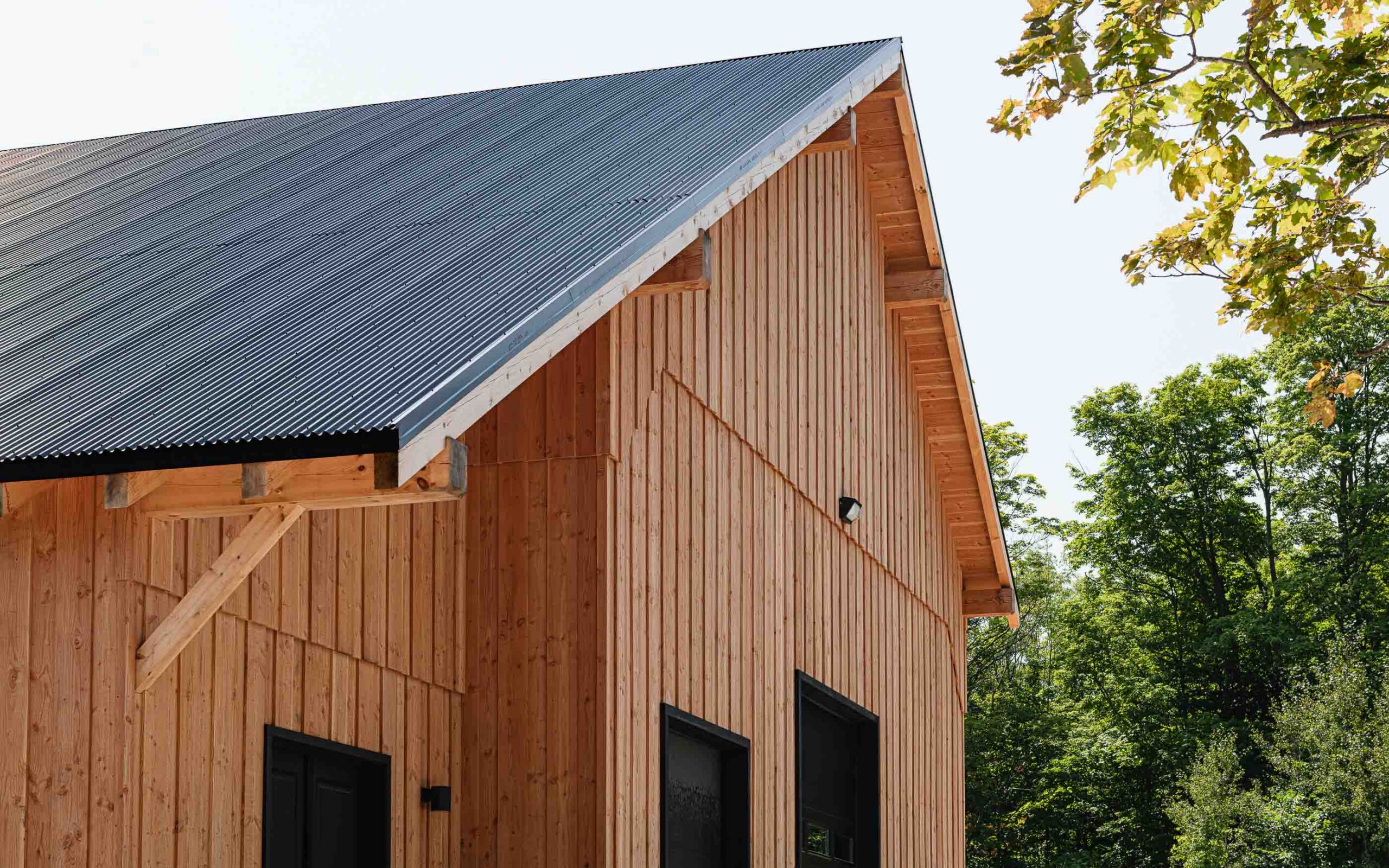 front elevation detail of a modern timber frame barn near Maeford Ontario