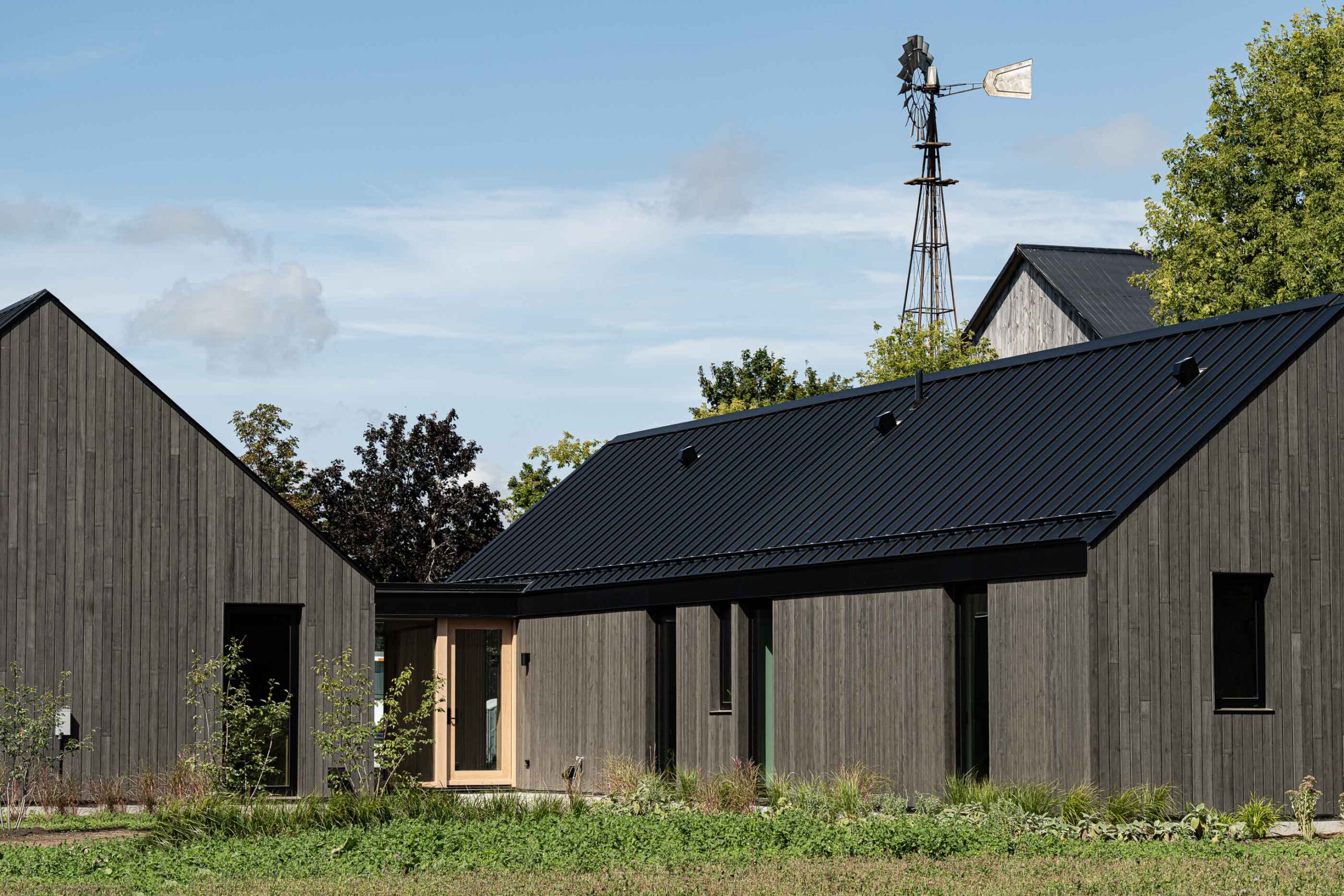 rear elevation detail of a Scandinavian-style modern barn being built in The Blue Mountains