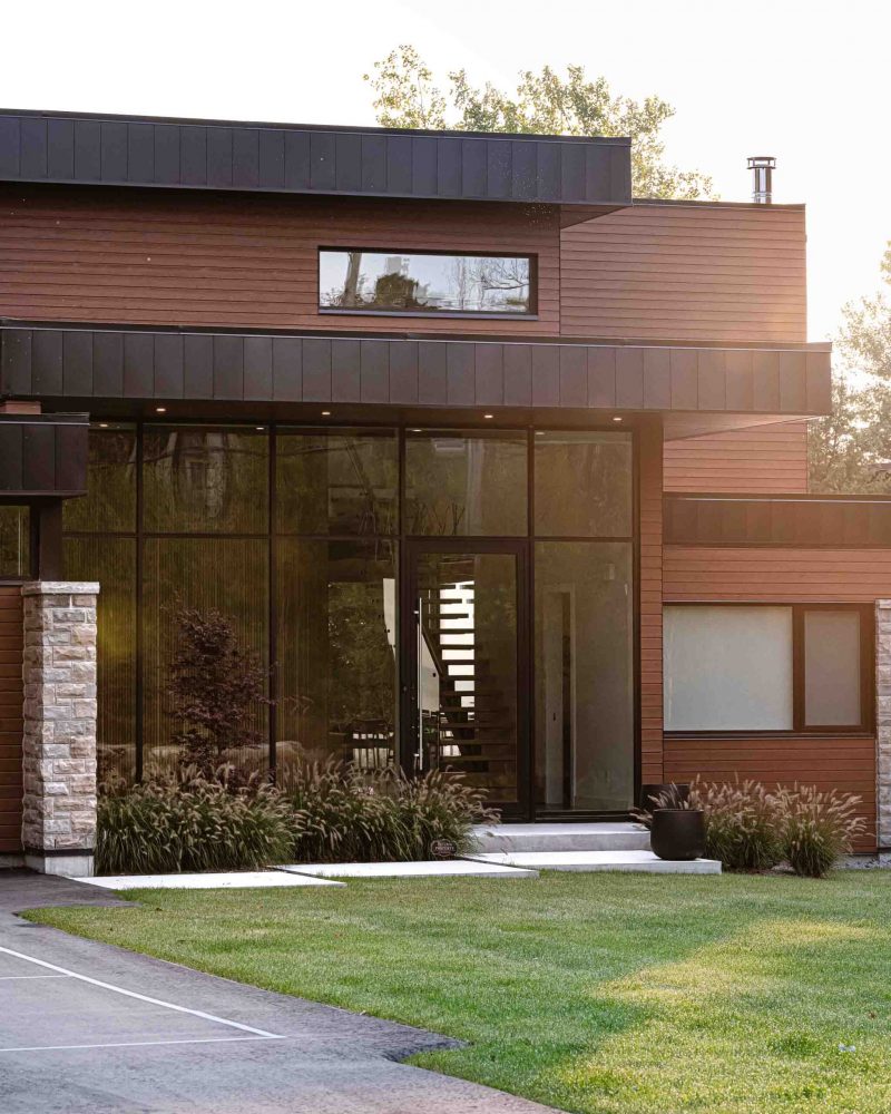 14-248-Bayside exterior of the front of a modern custom home built by Blake Farrow Project