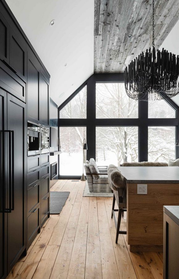14-262-Chalet Dark moody kitchen in a modernized rustic chalet renovation by Blake Farrow Project, designed by FAD