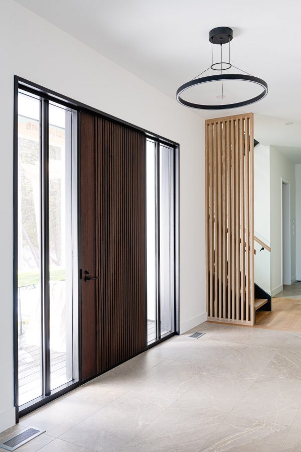 Front door detail in modern beach house built by blue mountain custom home builder