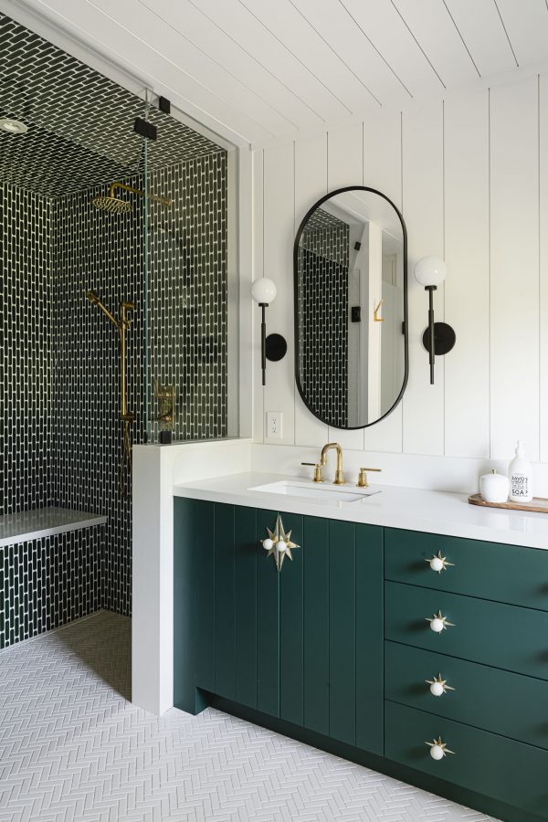 colourful tile, shiplap and millwork in a whimsical chalet bathroom