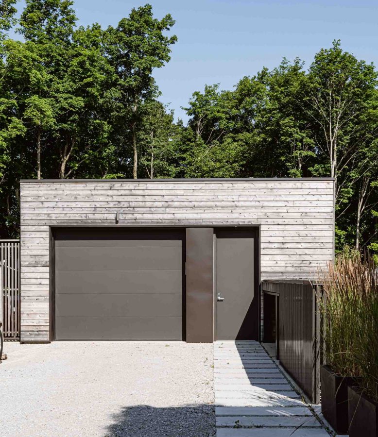 A modern garage built by Blake Farrow Project, designed by AKB