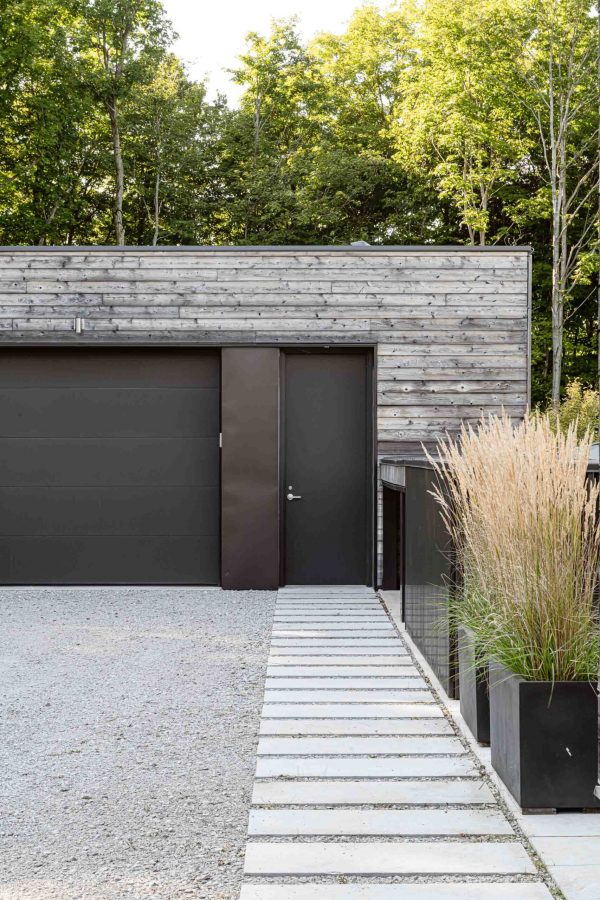 exterior of a minimalist, modern garage and shop