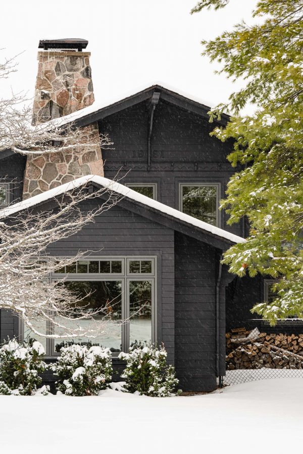 Front view of renovated blue mountain chalet with cohesive addition