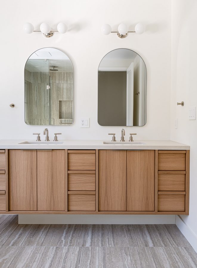 Primary bathroom with modern tile and beach house design by Collingwood custom home builder