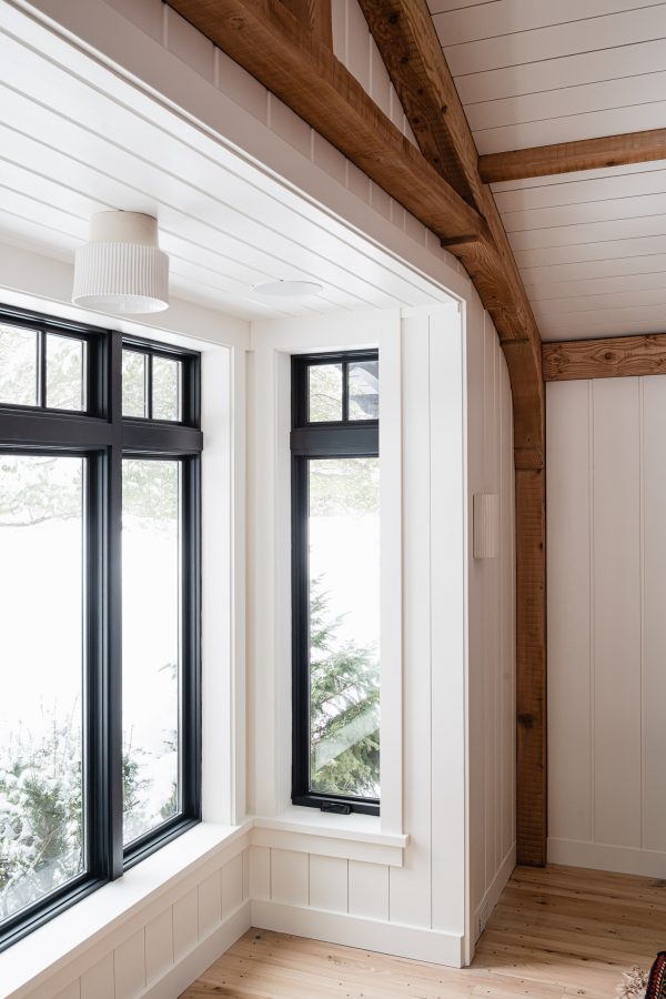 Restored timber beams and shiplap detail in a blue mountain chalet renovation