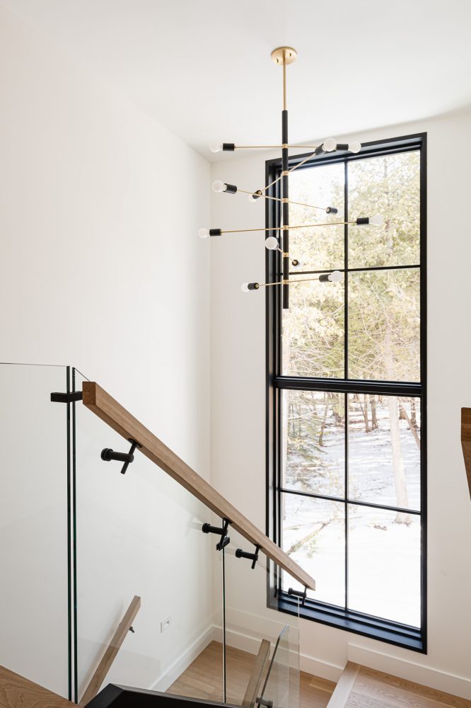 stairway light fixture detail in a modern beach house