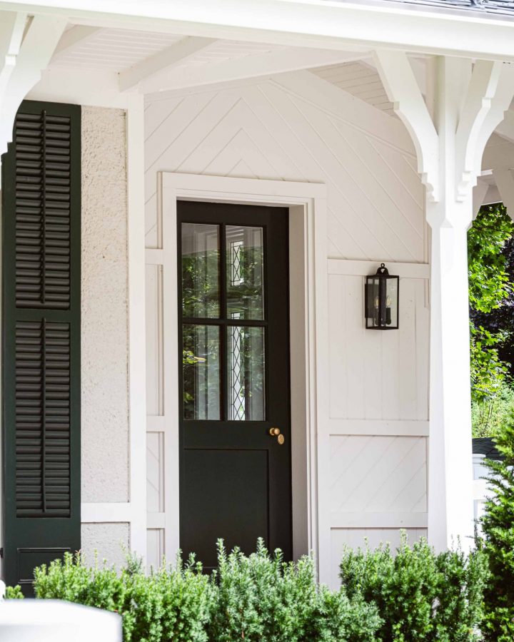 Front door detail showcasing the intricate wood siding detail on a heritage renovation project by Blake Farrow